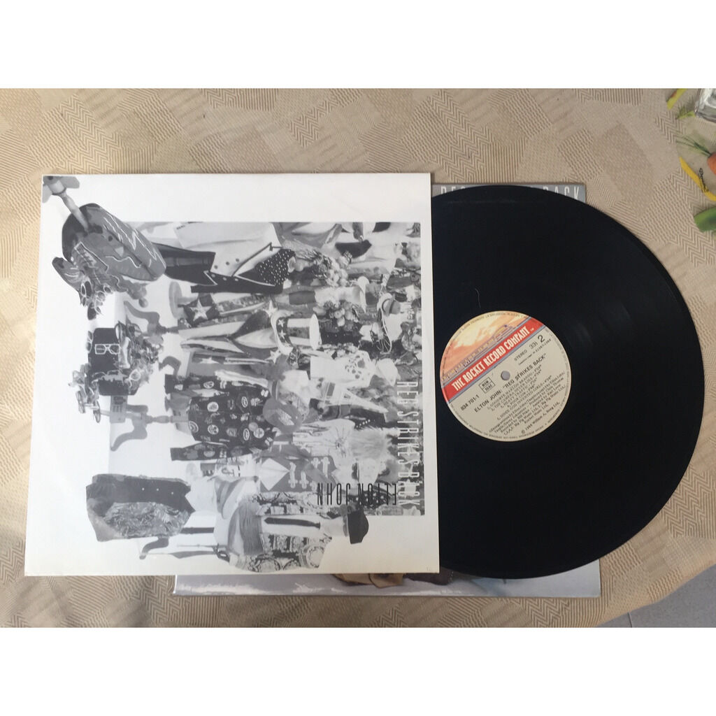 Reg strikes back de Elton John, 33T chez joanminerva Ref119976619